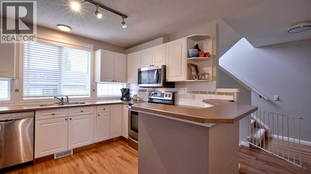 20 Tuscany Valley Park NW — photo 11