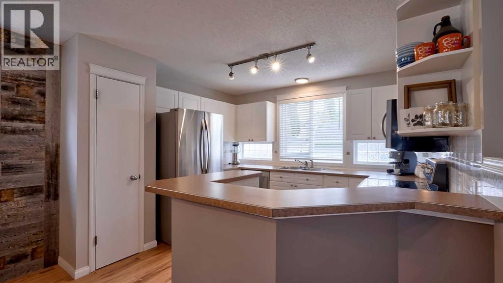 20 Tuscany Valley Park NW — photo 12