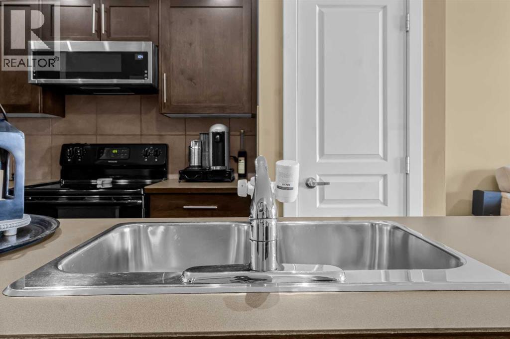 306, 10 Panatella Road NW — photo 11
