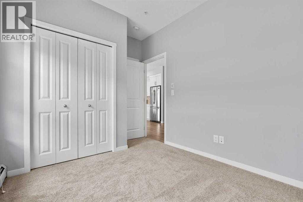 107, 360 Harvest Hills Common NE — photo 26