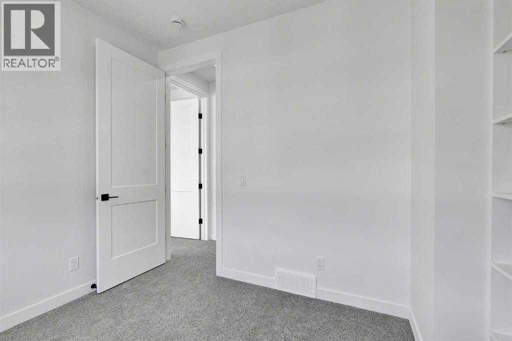 4903 Bowness Road NW — photo 16