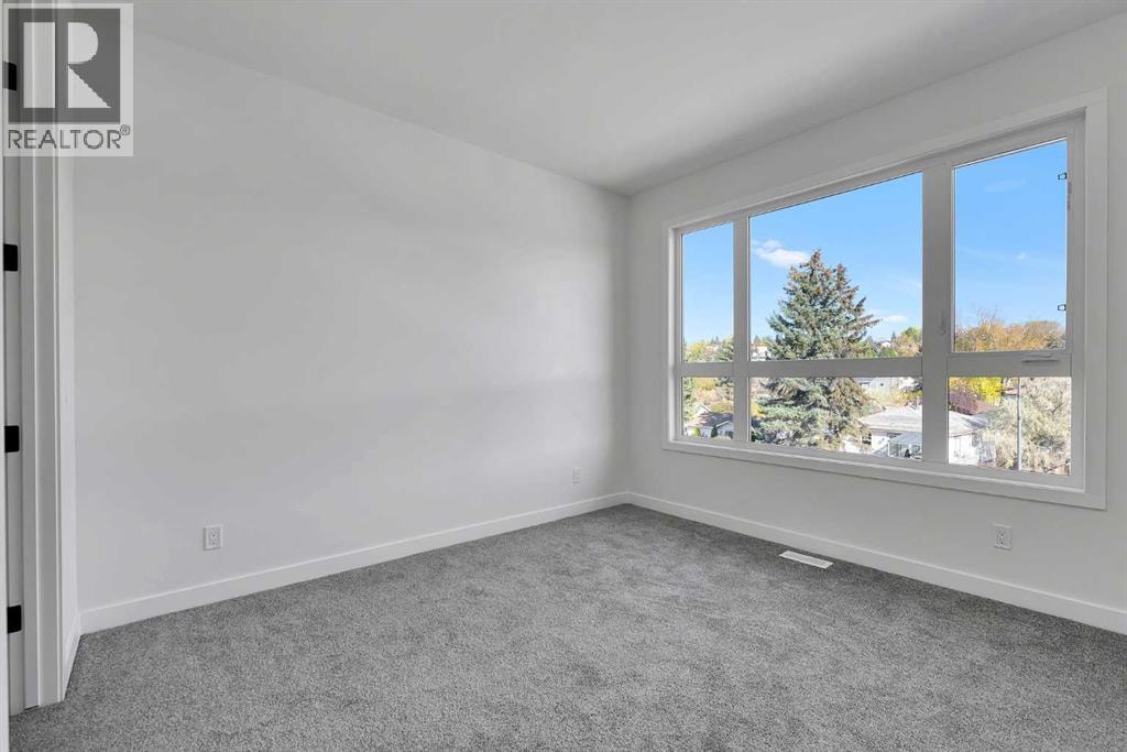 4905 Bowness Road NW — photo 9