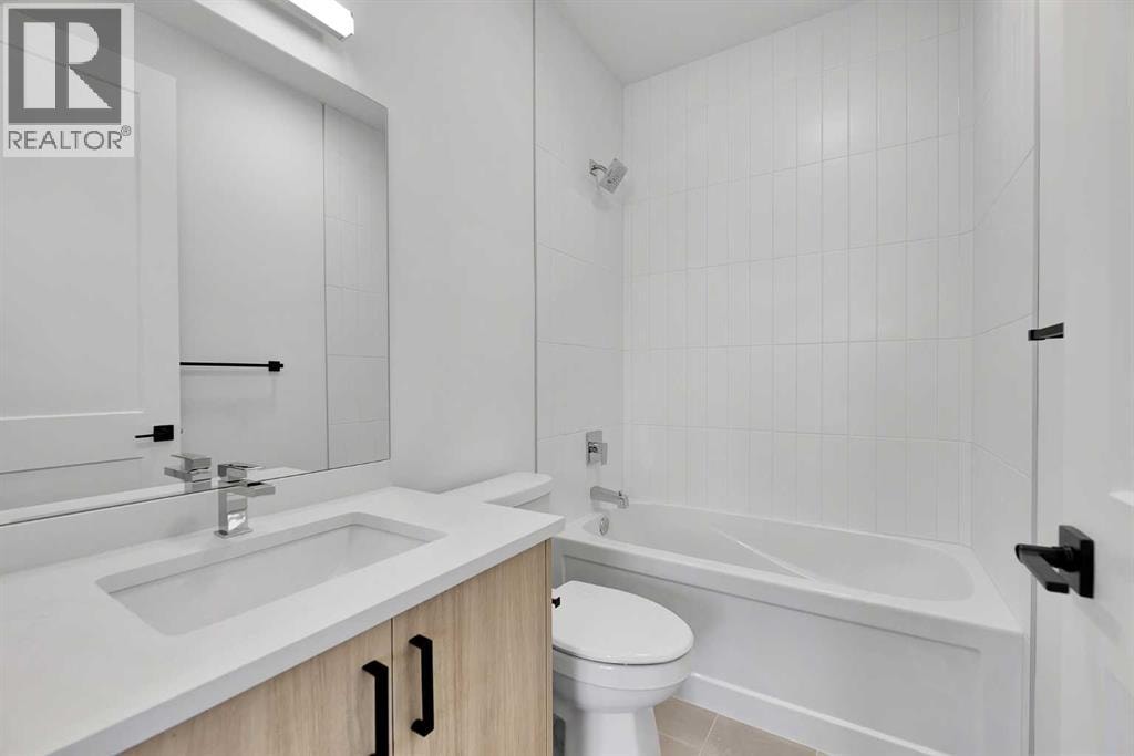 4905 Bowness Road NW — photo 12