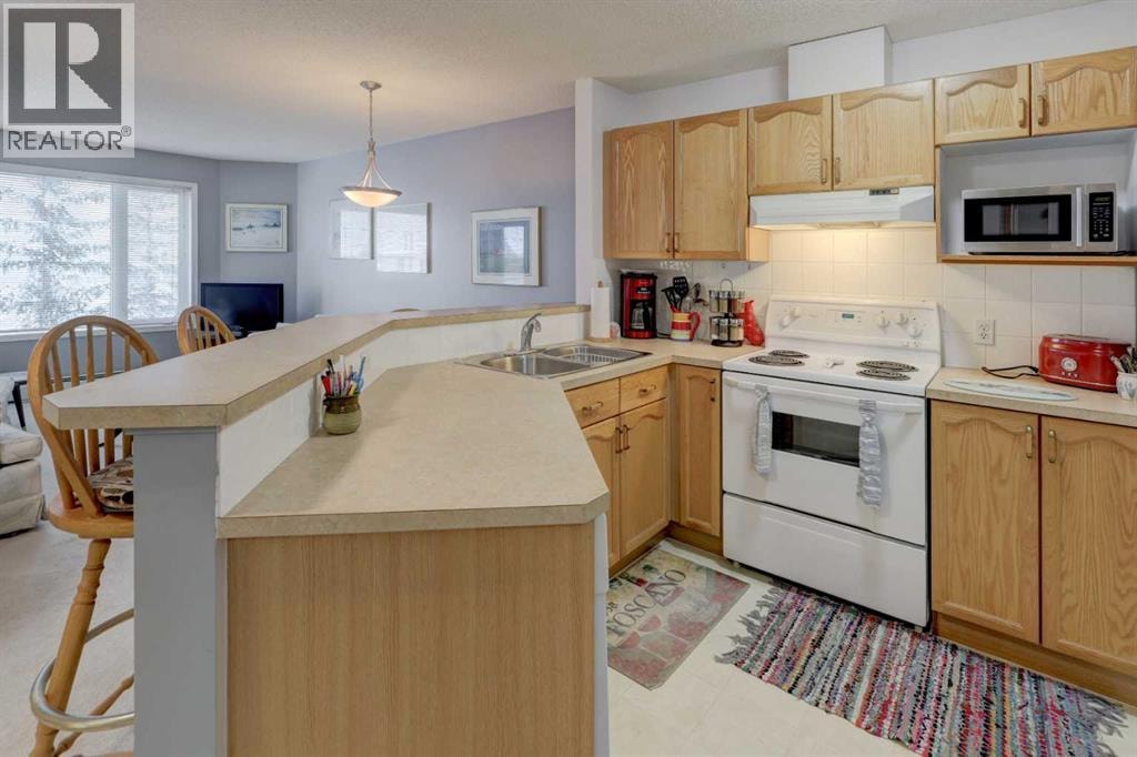 1316, 950 Arbour Lake Road NW — photo 6