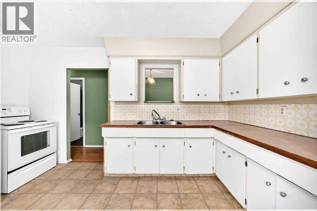 416/418 33 Avenue NE — photo 10