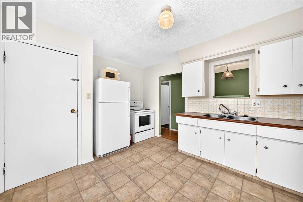 416/418 33 Avenue NE — photo 11