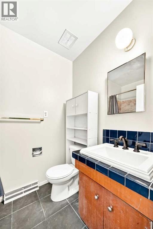 416/418 33 Avenue NE — photo 25