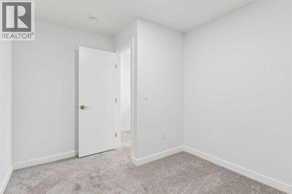 203, 95 Saddlecrest Circle NE — photo 18