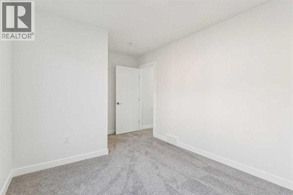 203, 95 Saddlecrest Circle NE — photo 20