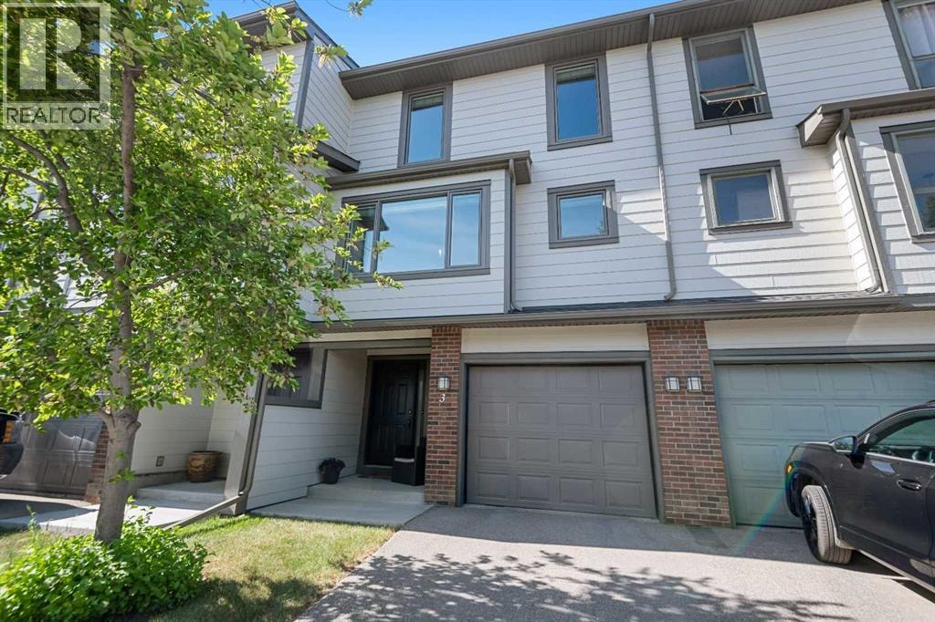 3, 185 Woodridge Drive SW — photo 1