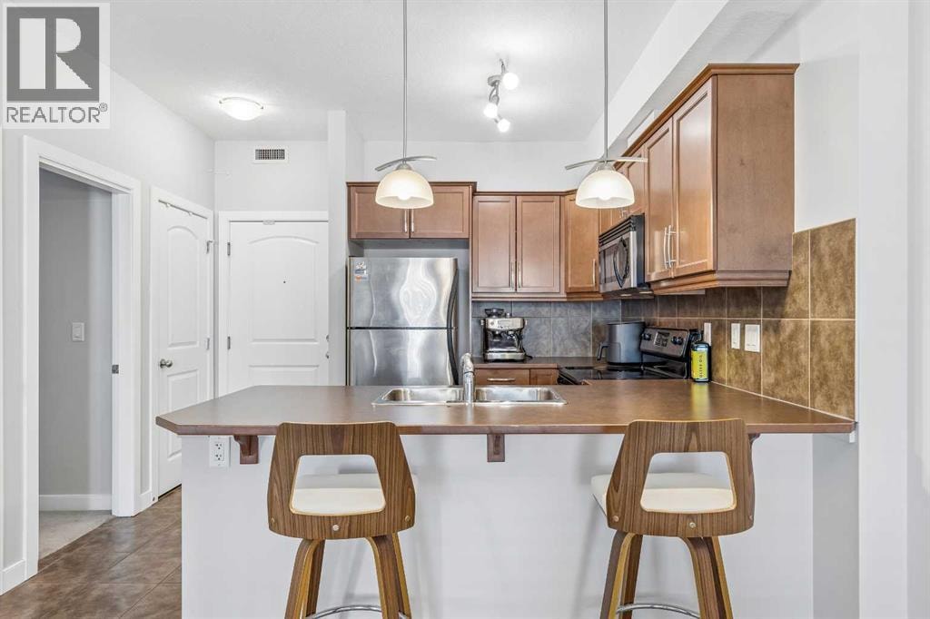 306, 15304 Bannister Road SE — photo 5