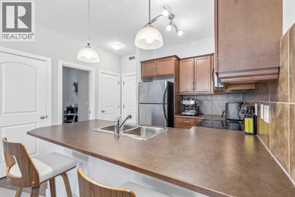 306, 15304 Bannister Road SE — photo 6