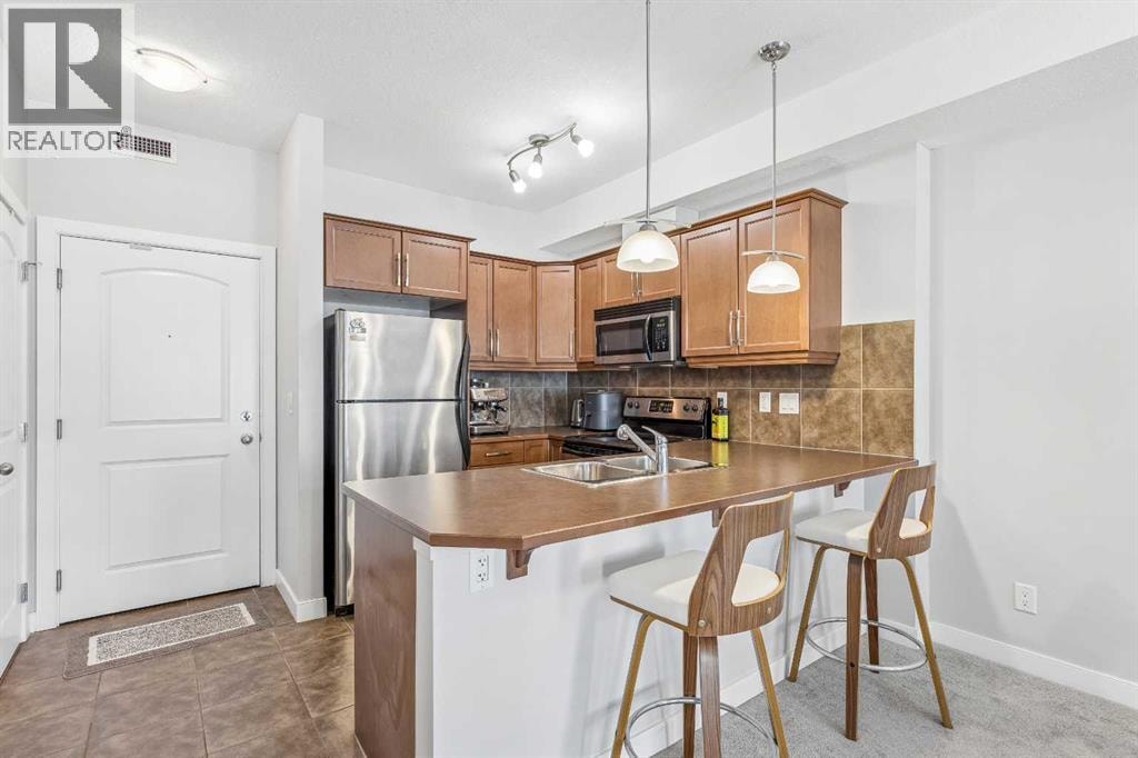 306, 15304 Bannister Road SE — photo 4