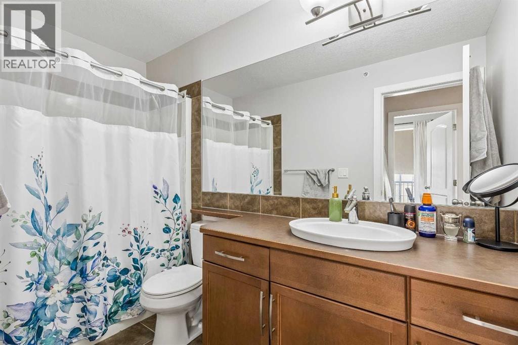 306, 15304 Bannister Road SE — photo 20