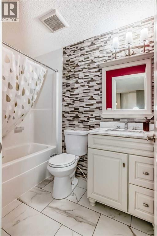 336, 23 Millrise Drive SW — photo 32
