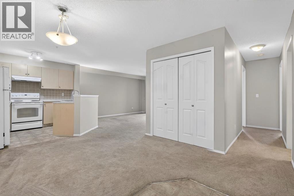7103, 304 Mackenzie Way SW — photo 15