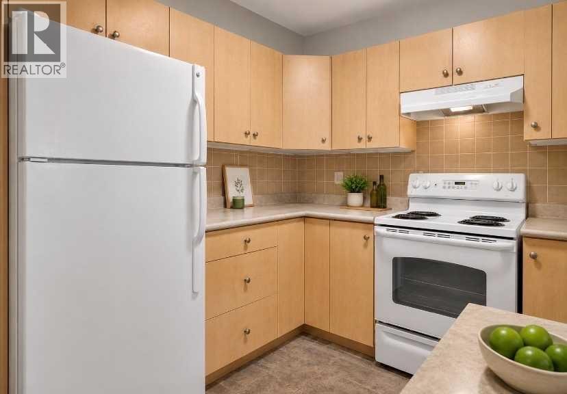 7103, 304 Mackenzie Way SW — photo 5