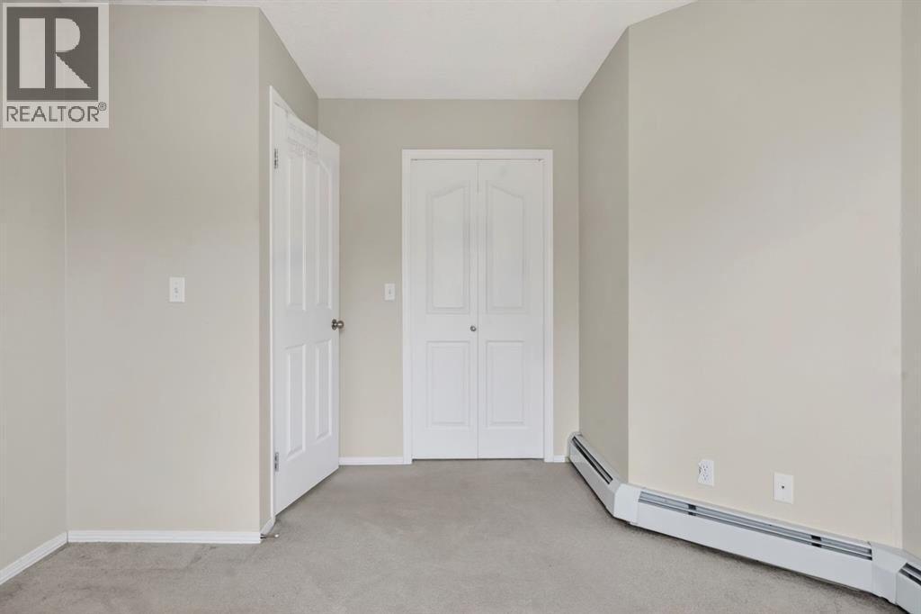 7103, 304 Mackenzie Way SW — photo 19