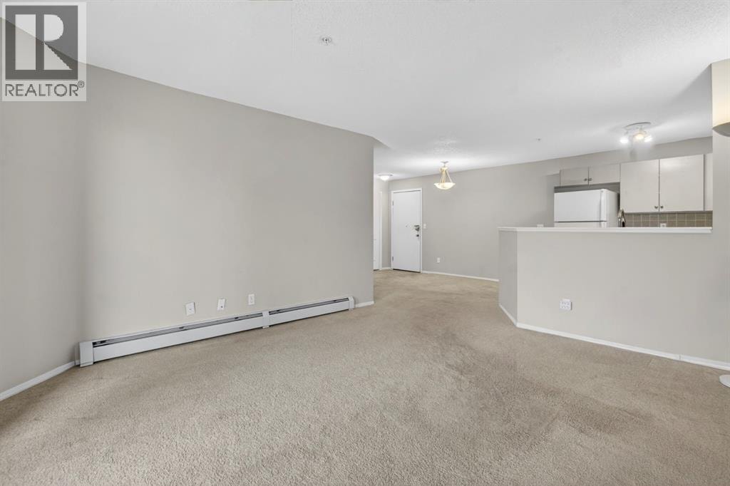 7103, 304 Mackenzie Way SW — photo 14