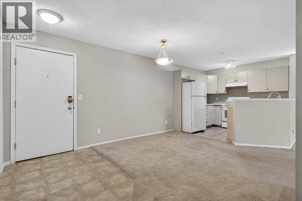 7103, 304 Mackenzie Way SW — photo 9