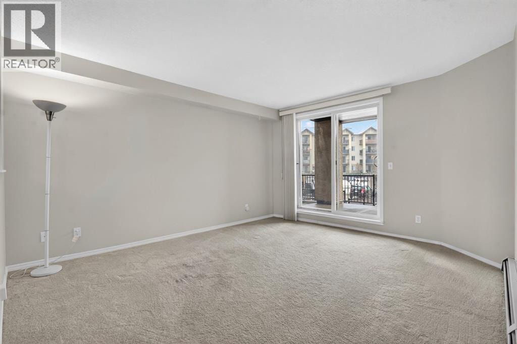 7103, 304 Mackenzie Way SW — photo 13