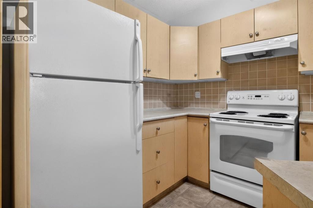 7103, 304 Mackenzie Way SW — photo 12