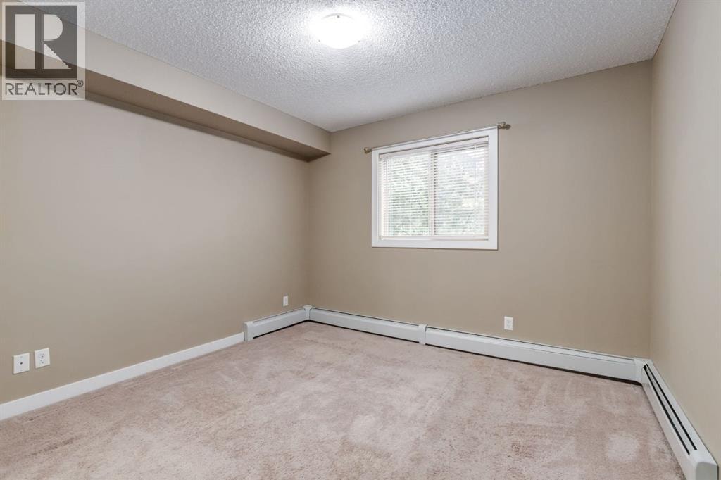 9116, 403 Mackenzie Way SW — photo 11