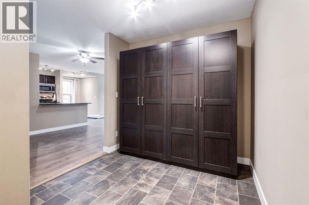 9116, 403 Mackenzie Way SW — photo 23