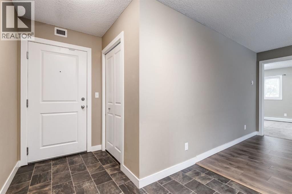 9116, 403 Mackenzie Way SW — photo 25