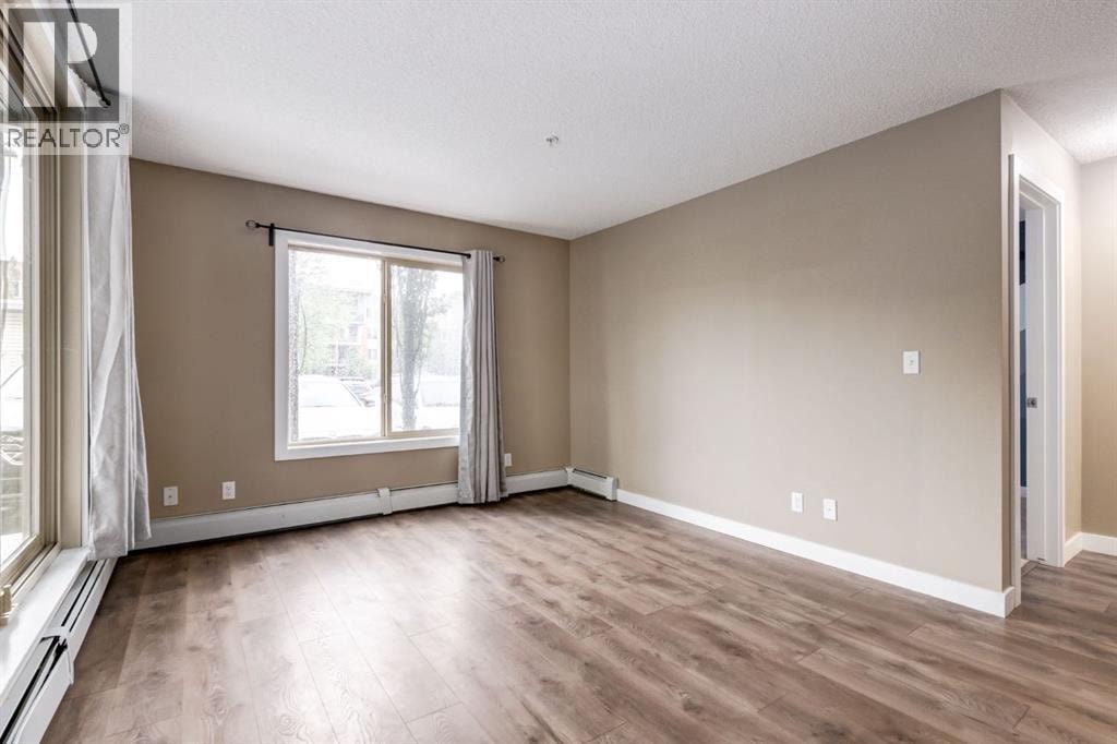 9116, 403 Mackenzie Way SW — photo 19