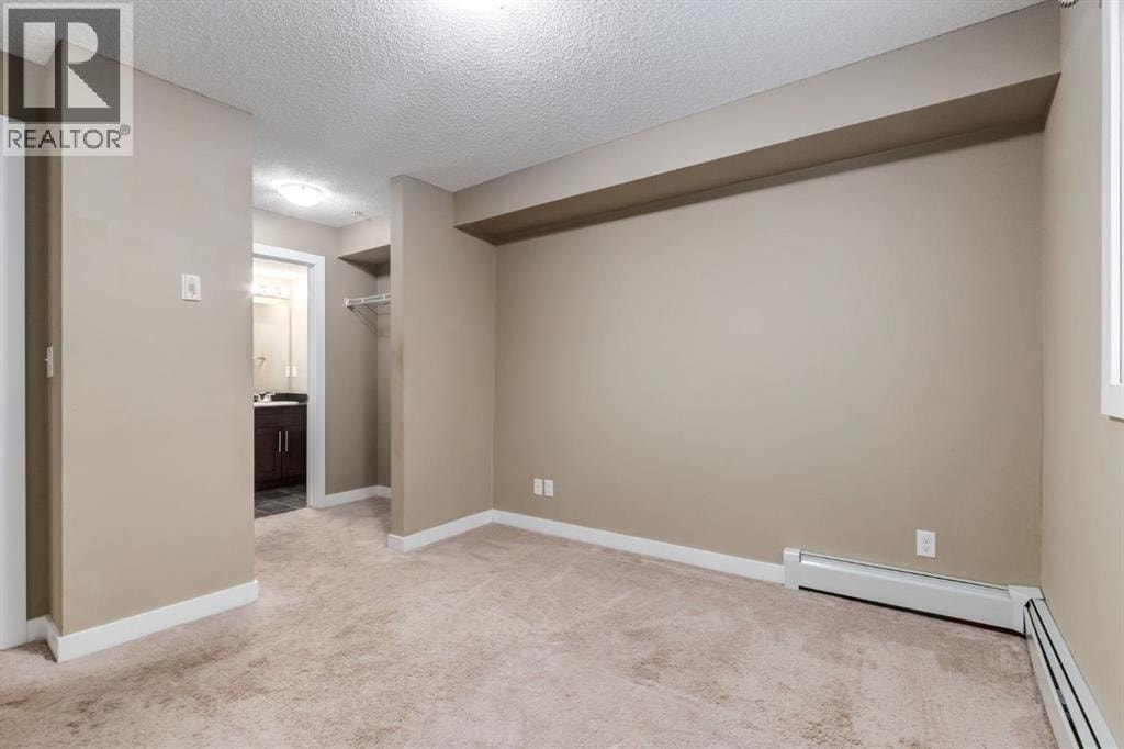 9116, 403 Mackenzie Way SW — photo 12