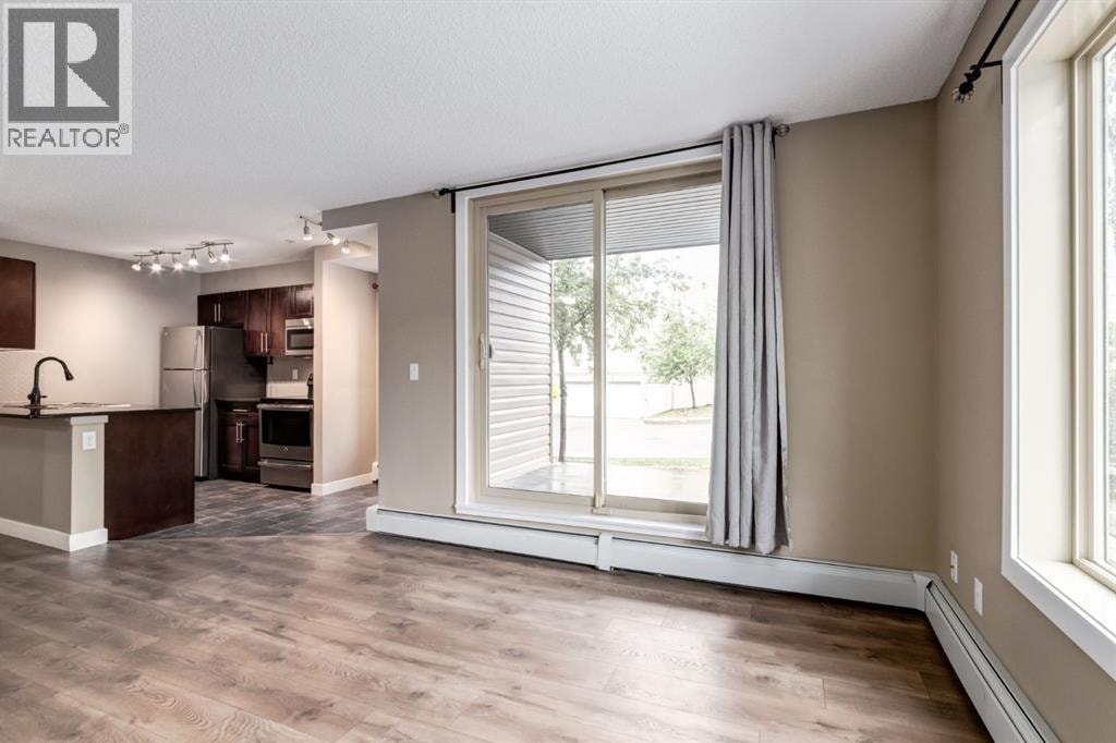 9116, 403 Mackenzie Way SW — photo 18