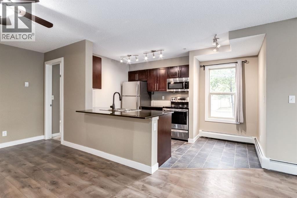 9116, 403 Mackenzie Way SW — photo 8