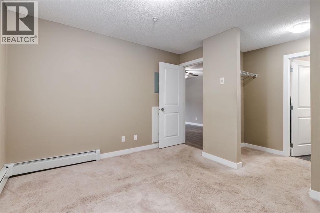 9116, 403 Mackenzie Way SW — photo 22