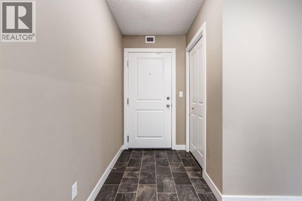 9116, 403 Mackenzie Way SW — photo 24