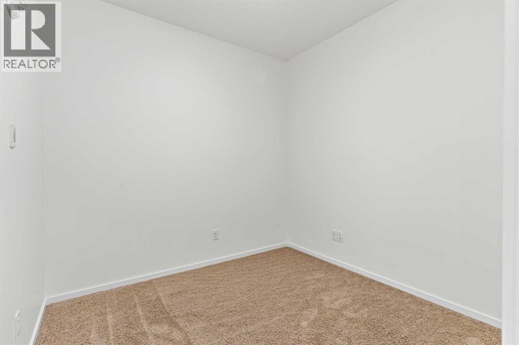1205, 215 Legacy Boulevard SE — photo 6