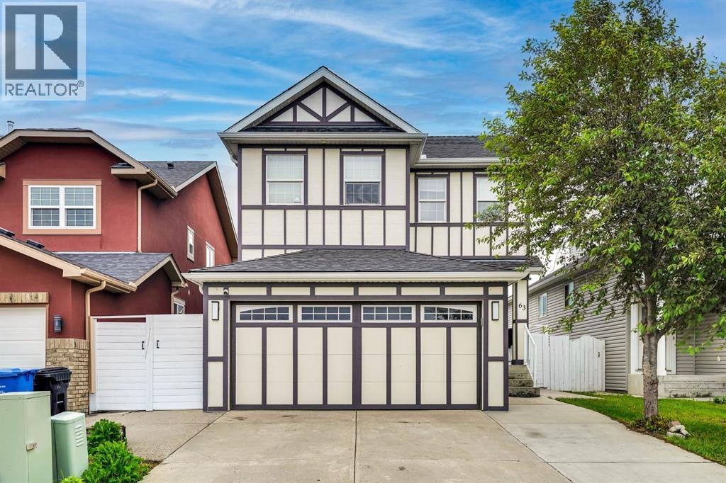 63 Saddlemont Crescent NE — photo 1