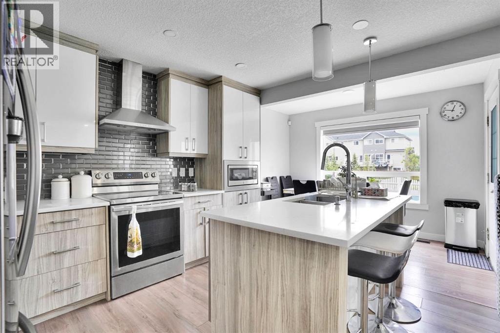 63 Saddlemont Crescent NE — photo 8