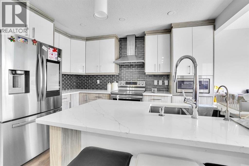 63 Saddlemont Crescent NE — photo 9