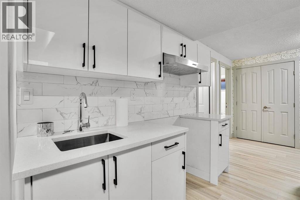 63 Saddlemont Crescent NE — photo 32
