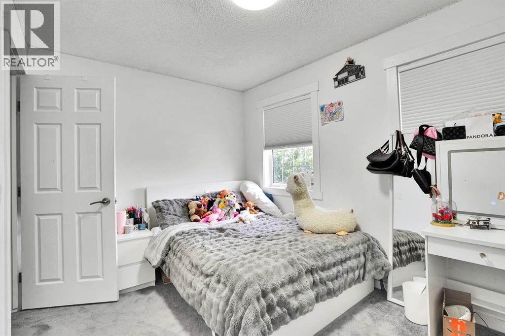 63 Saddlemont Crescent NE — photo 26