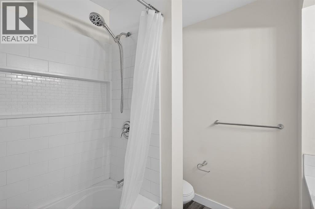 707, 13104 Elbow Drive SW — photo 24