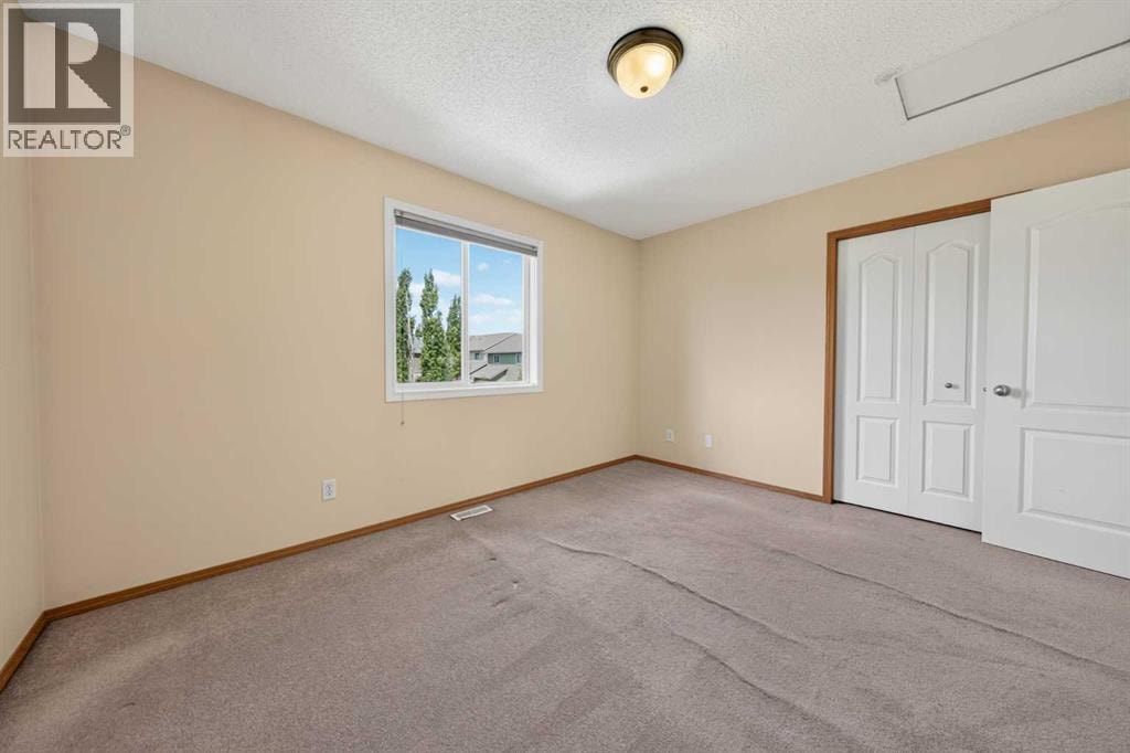 63 Cougartown Close SW — photo 31