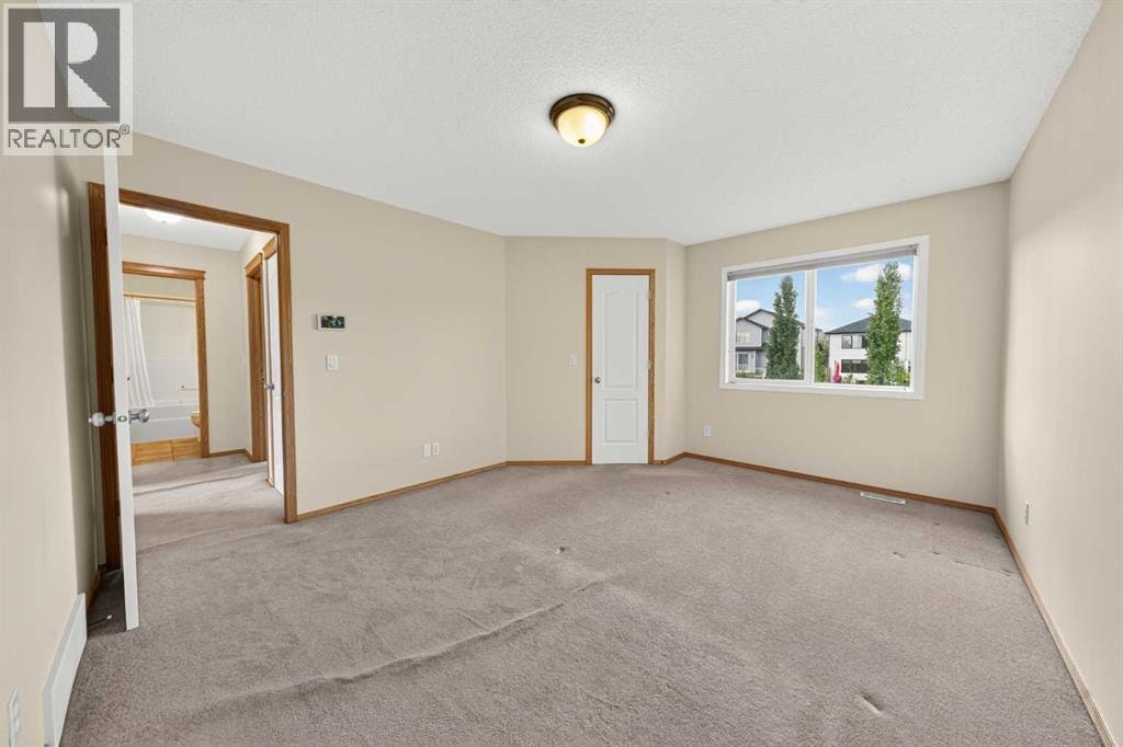 63 Cougartown Close SW — photo 28
