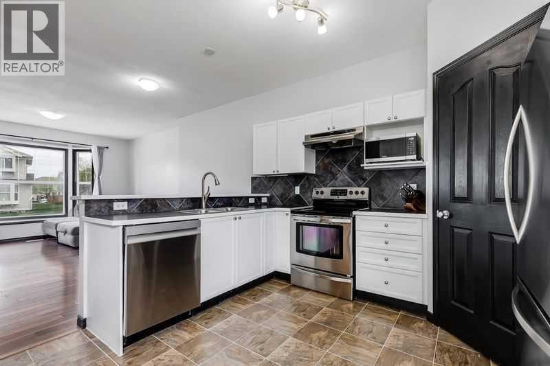 1001, 703 Luxstone Square SE — photo 8