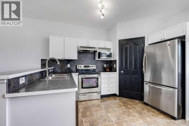 1001, 703 Luxstone Square SE — photo 6