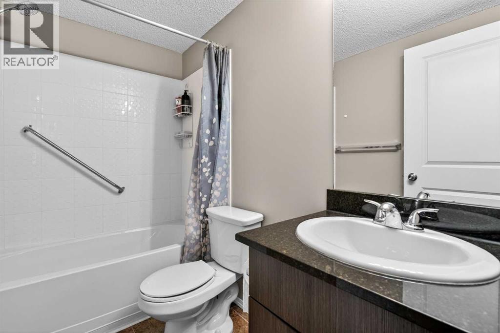 9103, 403 Mackenzie Way SW — photo 19