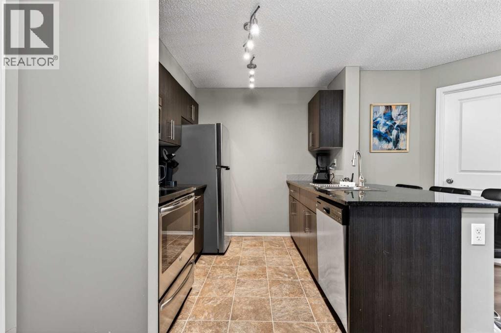9103, 403 Mackenzie Way SW — photo 2