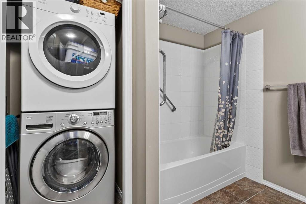 9103, 403 Mackenzie Way SW — photo 18