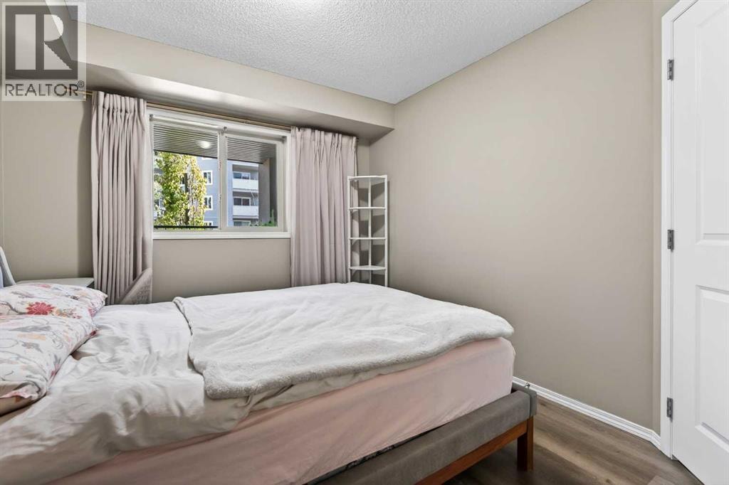 9103, 403 Mackenzie Way SW — photo 13